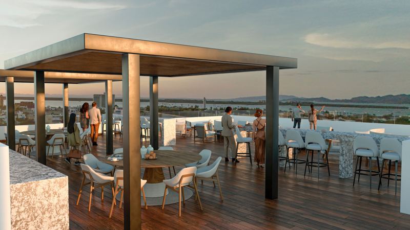 Rooftop con bar y vista a la bahía