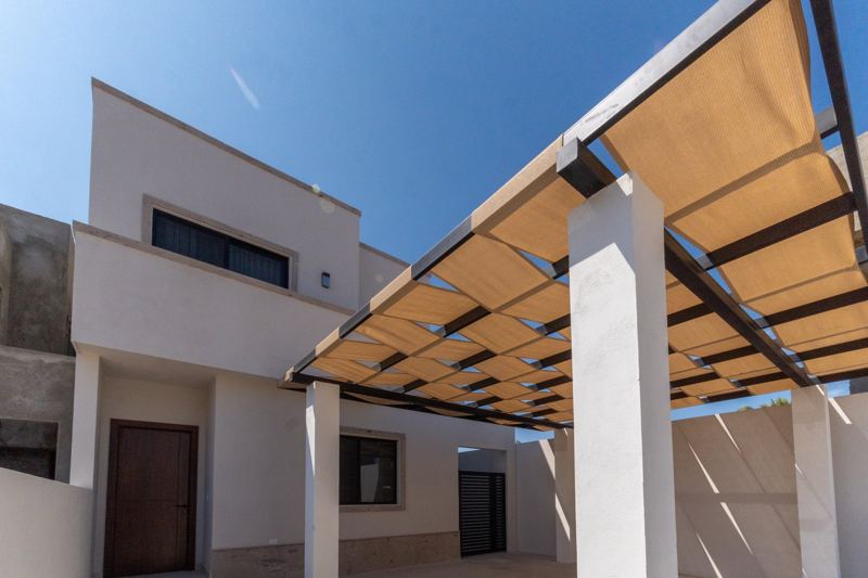 Fachada de la casa muestra de Seaside Villas